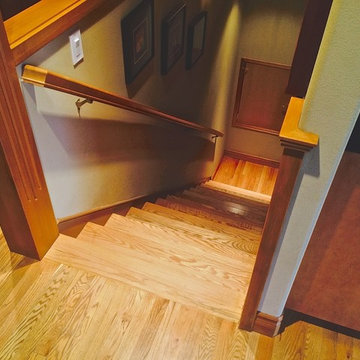 Added a skirt board on basement stair, handrail side