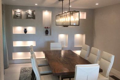 Kitchen/dining room combo - mid-sized contemporary ceramic tile and gray floor kitchen/dining room combo idea in Tampa with white walls