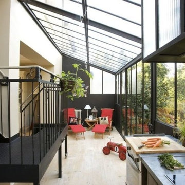 Maison à escalier roulant