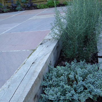 Small sloping riverside garden in Caversham, Reading