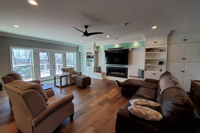 Example of a transitional family room design in Other