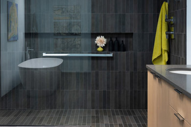Bathroom - large contemporary master blue tile and ceramic tile ceramic tile, gray floor and double-sink bathroom idea in Portland with flat-panel cabinets, brown cabinets, a one-piece toilet, blue walls, an undermount sink, quartz countertops, gray countertops, a niche and a freestanding vanity