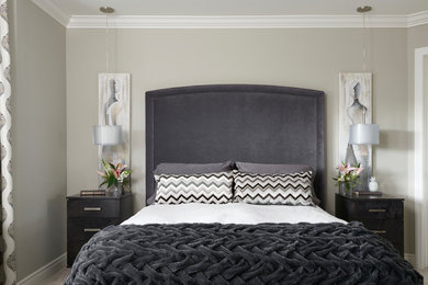 Photo of a mid-sized transitional master bedroom in Toronto with grey walls, carpet, no fireplace and beige floor.