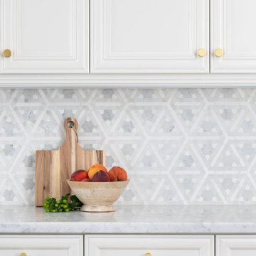 Breathtaking Geometric Backsplash Design with Marble Tiles