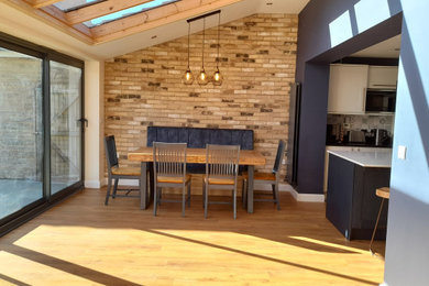 This is an example of a contemporary dining room in Oxfordshire.
