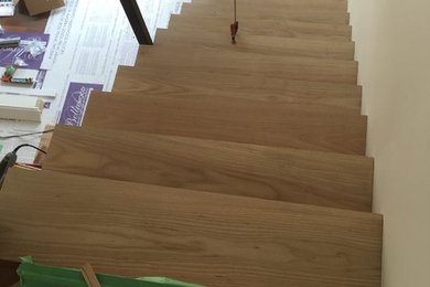 Staircase - contemporary staircase idea in Other