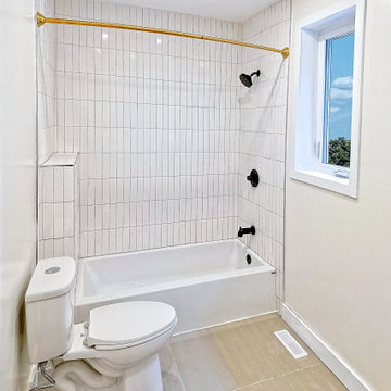 Simple Yet Stunning Mosaic Tiled, Two-Tone Fixturee Bathroom