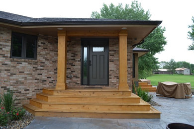 Inspiration for a transitional exterior home remodel in Other