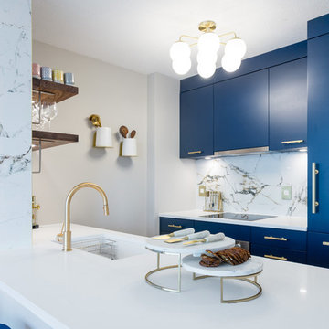Navy blue, white and brass hardware kitchen