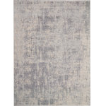 Nourison - Nourison Rustic Textures 9'3" x 12'9" Ivory/Silver Modern Indoor Area Rug - This beautifully carved contemporary rug from the Rustic Textures Collection features distressed ivory pile for a weathered, rustic d�cor feel that adds depth and texture to any space. High-low pile construction and subtly shifting colors are at home in urban and cabin settings alike.