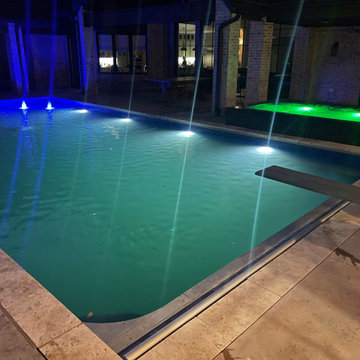 Polymer vinyl liner pool w/concrete spillover spa & automatic pool cover