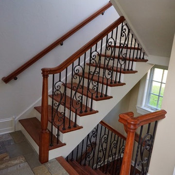 Straight And Platform Stairs With Iron Balustrade