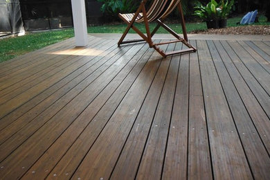 Inspiration for a mid-sized timeless backyard deck remodel in Other