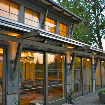 Wall of glass doors will soon be framed in climbing vines on trellis above