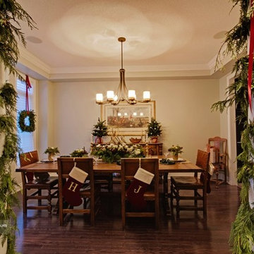Holiday stockings act as place cards and individual mason jars with flower arran