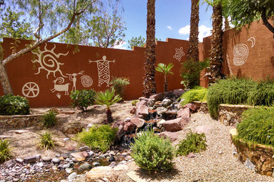 Design ideas for a mid-sized backyard partial sun formal garden in Las Vegas with a water feature and gravel.