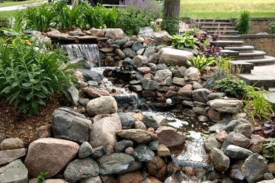 Photo of a small rustic partial sun hillside pond in Other for summer.