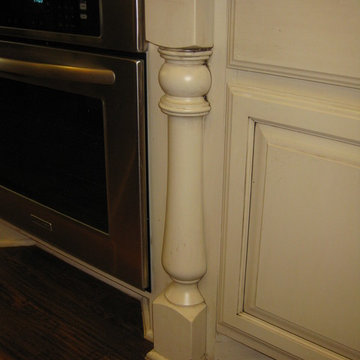 decorative post next to oven by Burrows Cabinets