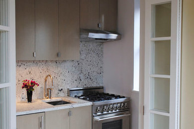 Kitchen - small modern kitchen idea in New York