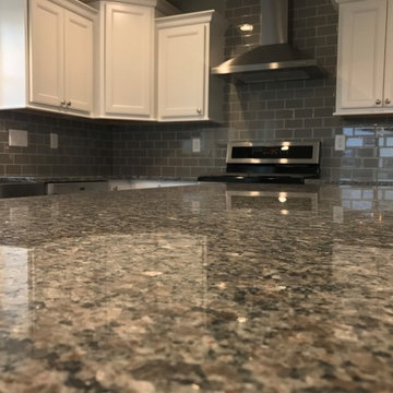 New Construction-Colona, IL Koch Lexington Painted White Caledonia Granite