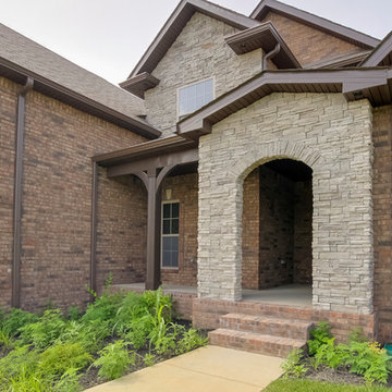 Brick and Stone Two Story with Neighborhood Amenities