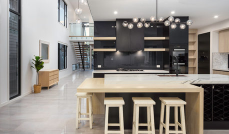 7 Stylish Ways to Make Black Kitchen Cabinets Work
