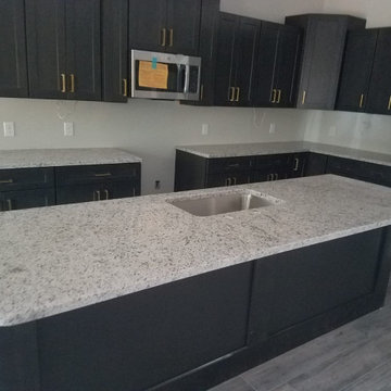 White G Granite Kitchen Countertops with Black Cabinets