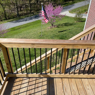 Deck stain and gutters powerwash