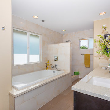 MLS 281655 | Master Bathroom with ceiling tub filling faucet, custom tile work t