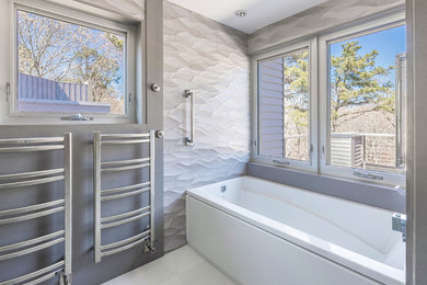 Trendy master gray tile and ceramic tile ceramic tile and white floor bathroom photo in Boston with gray walls