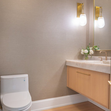 Contemporary Powder Room With Wall-Mounted Vanity and Kohler Bidet