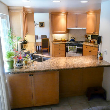 Angled Wall Transforms Corridor Kitchen