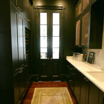 Recessed Cabinet Doors, Wood Island Countertop, and A Custom Hood Defines Style