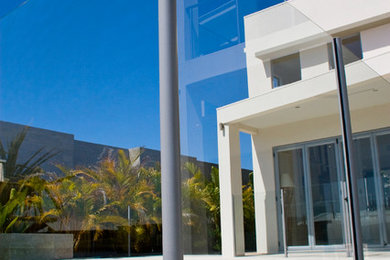Design ideas for a contemporary home design in Sunshine Coast.