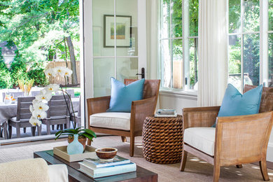 Inspiration for a mid-sized timeless formal and enclosed medium tone wood floor living room remodel in Boston with beige walls