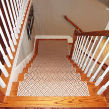 Stairway runner, chandelier, sconces