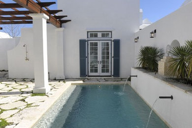 Tuscan courtyard pool photo in Birmingham