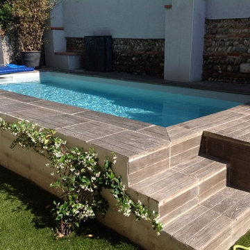 Création d'une piscine et d'un bar extérieur/ Maison de ville