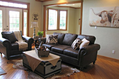Example of a farmhouse living room design in Houston