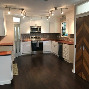 Mid-sized contemporary kitchen pantry designs - Inspiration for a mid-sized contemporary u-shaped kitchen pantry remodel in Jackson with shaker cabinets, white cabinets and no island