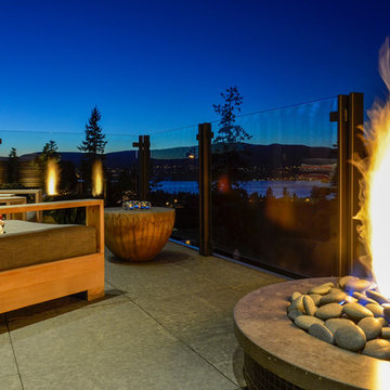 Upper level privacy deck platform with firepit