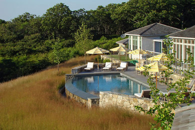 Example of a transitional exterior home design in Boston