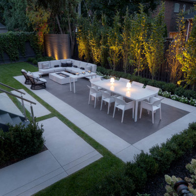Patio - mid-sized 1950s backyard concrete patio idea in Toronto with no cover
