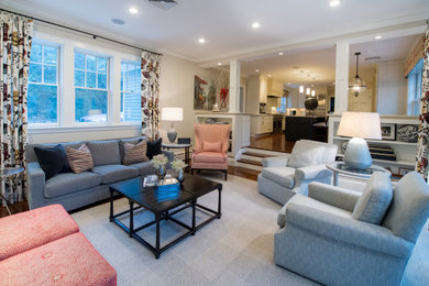 Example of a large transitional open concept medium tone wood floor and brown floor family room design in Boston with white walls