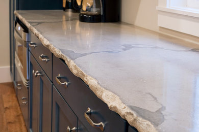 Design ideas for a contemporary kitchen in Charleston with concrete benchtops.