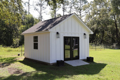 Inspiration for a small farmhouse detached shed remodel in Other