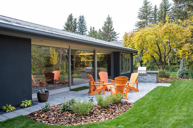 Patio - modern patio idea in Calgary