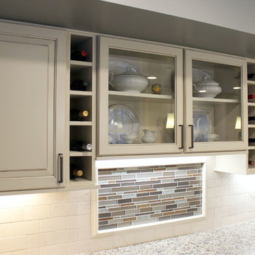 Beige Kitchen with Extra Large Island, Tile Backsplash and Granite Countertops