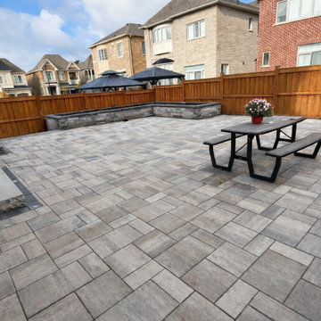 Backyard Patio Transformation – Unilock Trevista Pavers, Natural Stone Steps & L