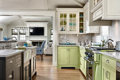Inspiration for a timeless l-shaped eat-in kitchen remodel in Philadelphia with a farmhouse sink, flat-panel cabinets and beige backsplash